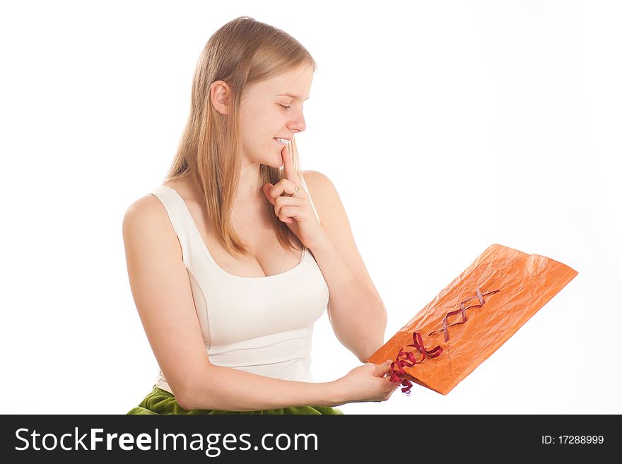 Young woman sit with gift bag