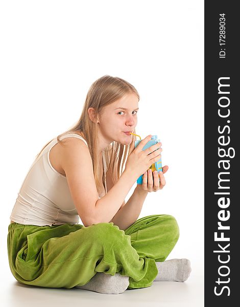 Woman with juice pack drink with tube