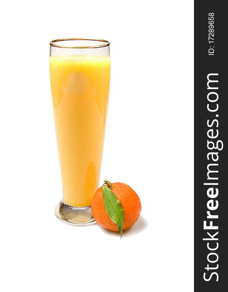 A glass of fresh orange juce with a ripe mandarin isolated over white