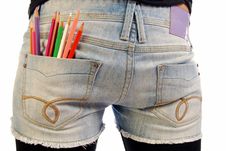 Colored Pencils In The Pocket Of Jeans Stock Photo