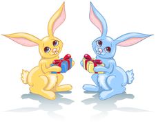 Two Rabbits And Gift. Royalty Free Stock Photos Two Rabbits And Gift. Royalty Free Stock Photos