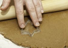 Pressing Cookie Cutter Into Dough Royalty Free Stock Image Pressing Cookie Cutter Into Dough Royalty Free Stock Image