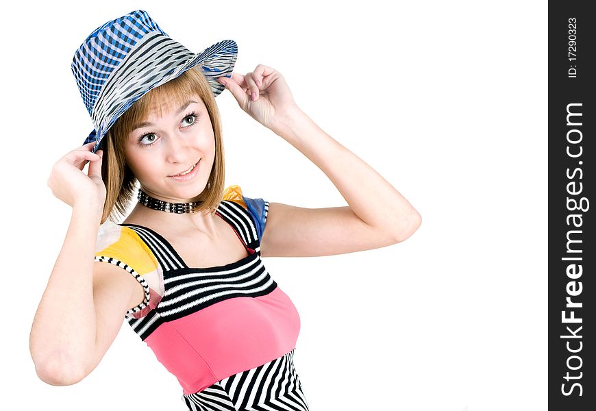 A cute teen girl tipping her hat, isolated