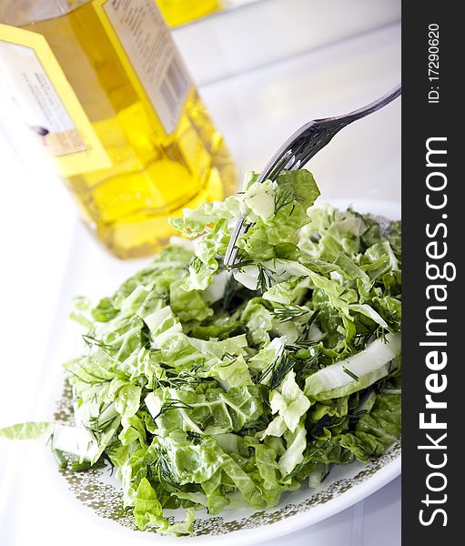 Lettuce leaf salad with olive oil