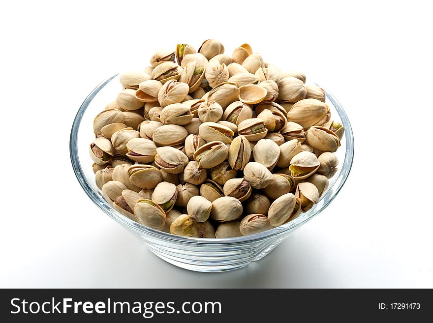 Pistachios nuts in glass bowl
