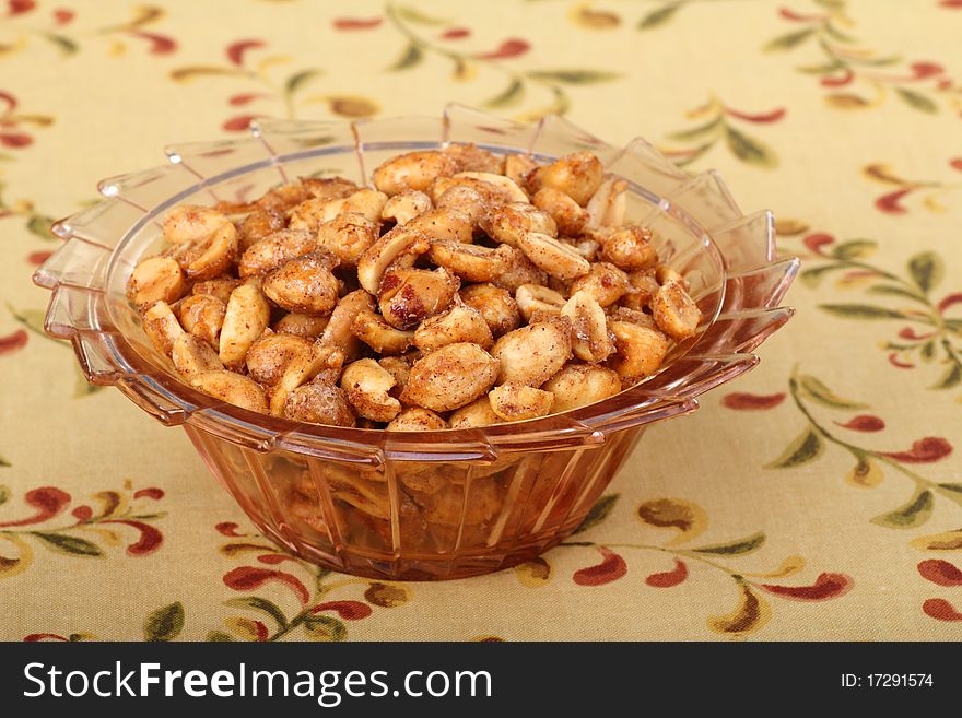 Roasted peanut snack in a glass bowl. Roasted peanut snack in a glass bowl