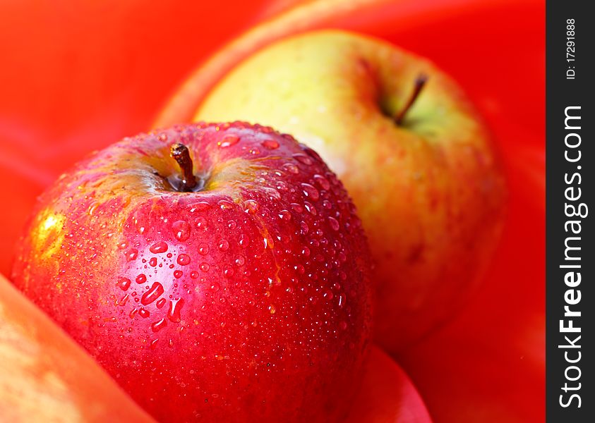 Fresh apple with water drops