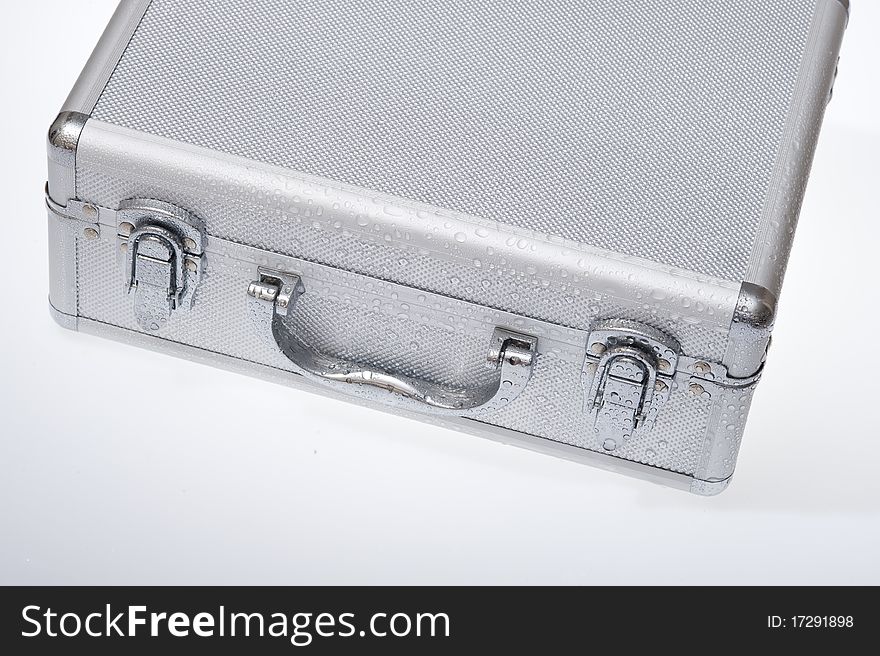 Metal suitcase isolated on the white background