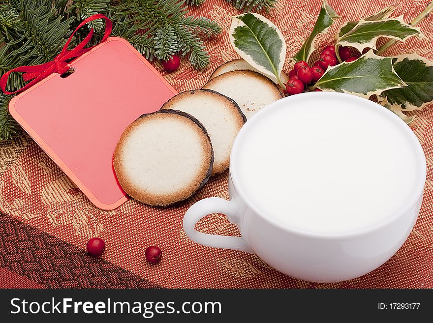 Greeting card with a small cookie for Santa Claus.