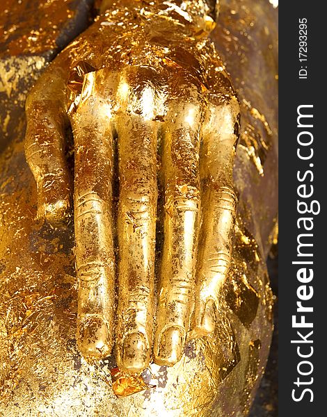 Buddha hand while holding the bowl.