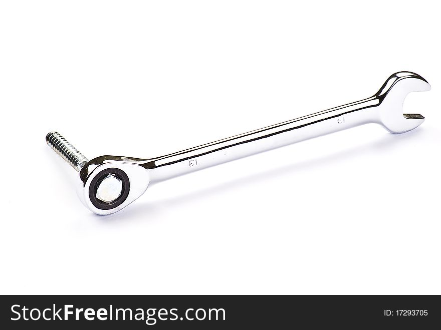 Stainless Steel Wrench and bolt over white background. Stainless Steel Wrench and bolt over white background