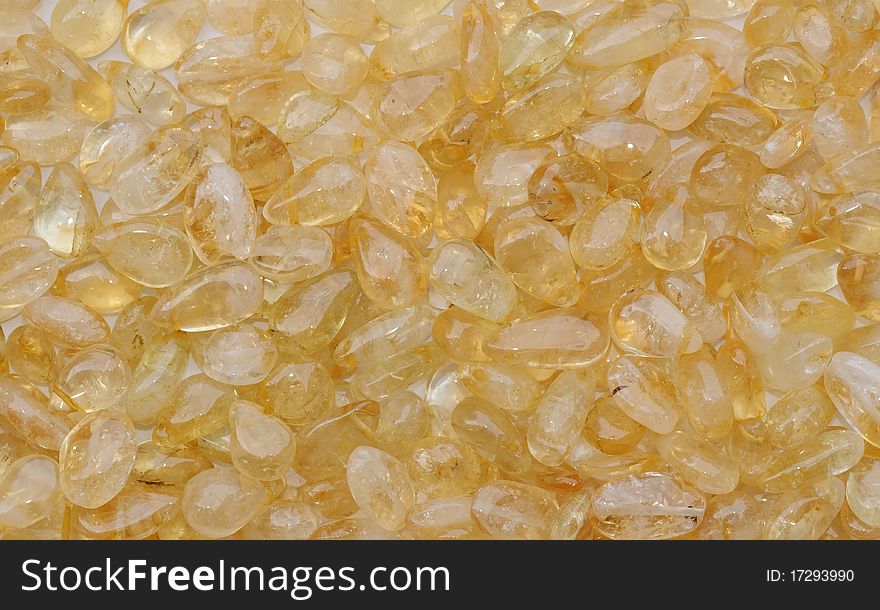 A background of citrine crystal stones. A background of citrine crystal stones