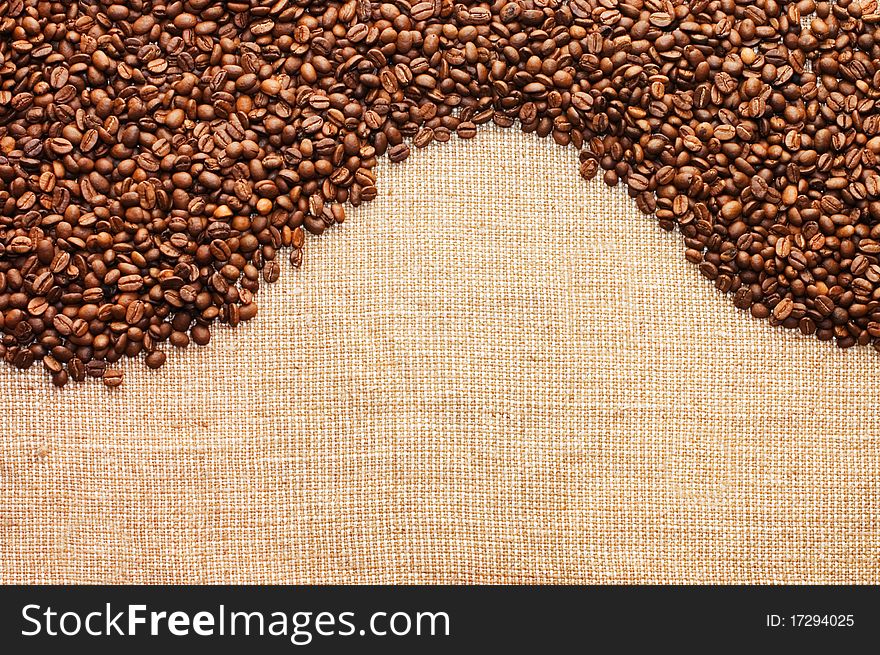 Brown Coffee Grains On A Sacking