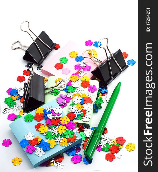 Confetti and office paper, white background