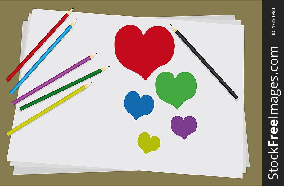 Six colored pencils paint a heart on a white sheet of paper. Six colored pencils paint a heart on a white sheet of paper