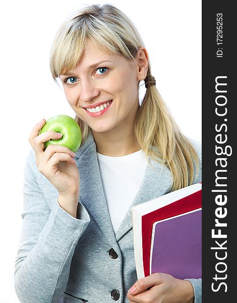 Portrait of blonde girl student with books and apple on the white background. Portrait of blonde girl student with books and apple on the white background