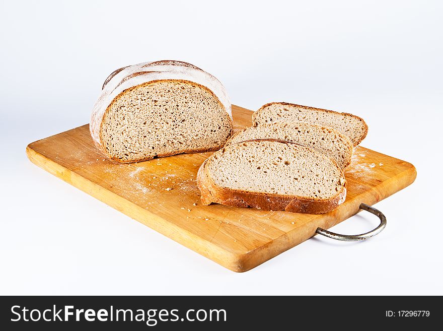 Сut bread lying on a chopping board