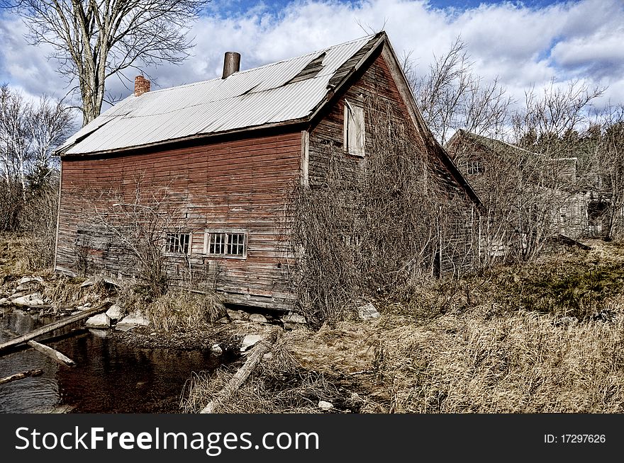 Abandoned Derelict Building overgrown with vines