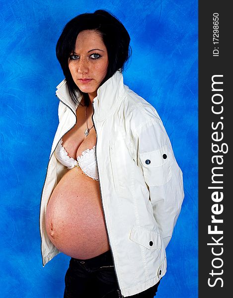 Pregnant woman on the blue mosaic background. Pregnant woman on the blue mosaic background