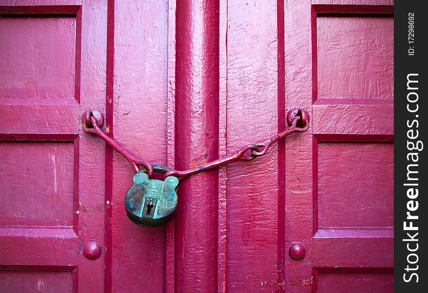Old Lock Green Key on Close Red Wood Door. Old Lock Green Key on Close Red Wood Door