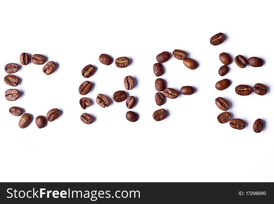 Letters made of coffee beans spelling CAFE on white background. Letters made of coffee beans spelling CAFE on white background