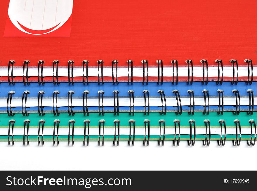 Spiral Edge Of Three Rectangular Notebooks