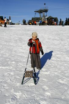 Boy With Sled Royalty Free Stock Photos