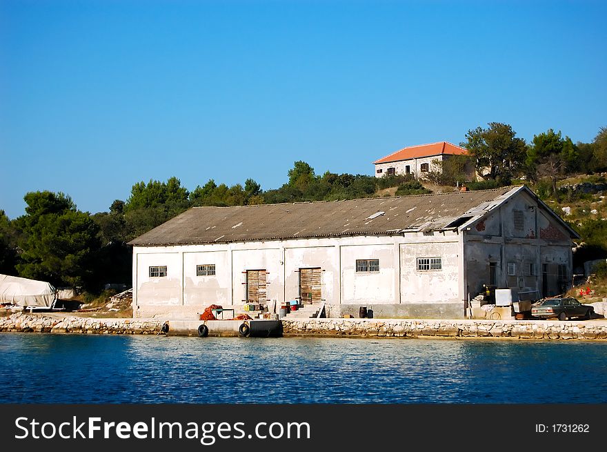 Old fishing factory in Croatian costal area.