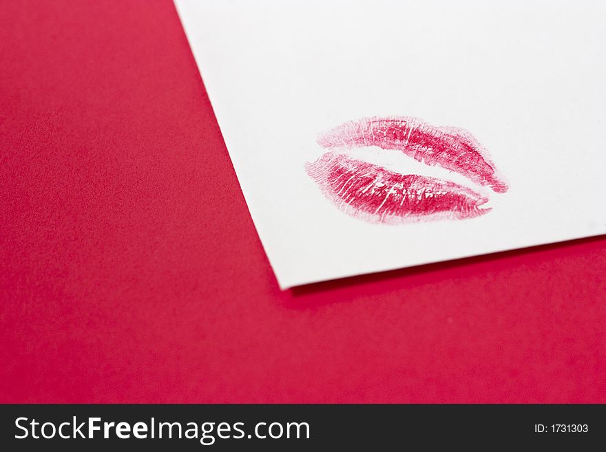 Kissing print on a white paper