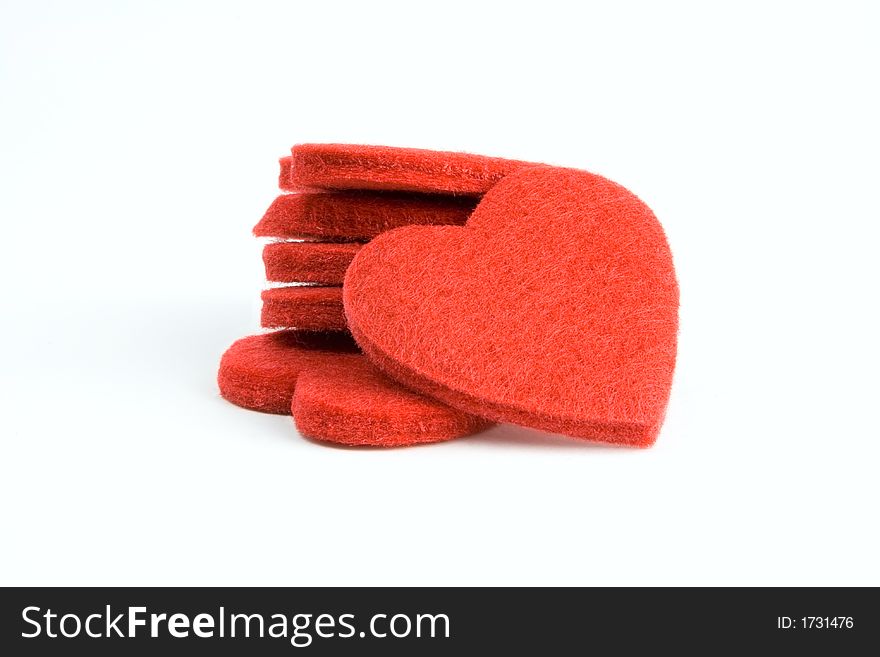 Six red felt hearts in a stack. Six red felt hearts in a stack