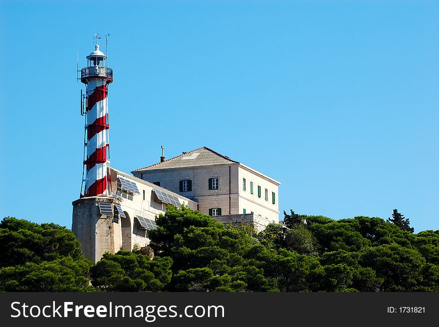 Lighthouse Blitvenica situated on small Croatian island. Lighthouse Blitvenica situated on small Croatian island.