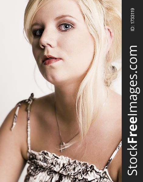 A model portrait on a white background. A model portrait on a white background