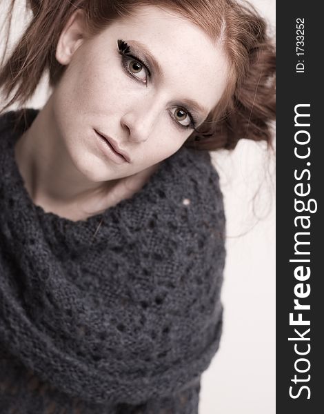 A model posing in the photo studio. A model posing in the photo studio