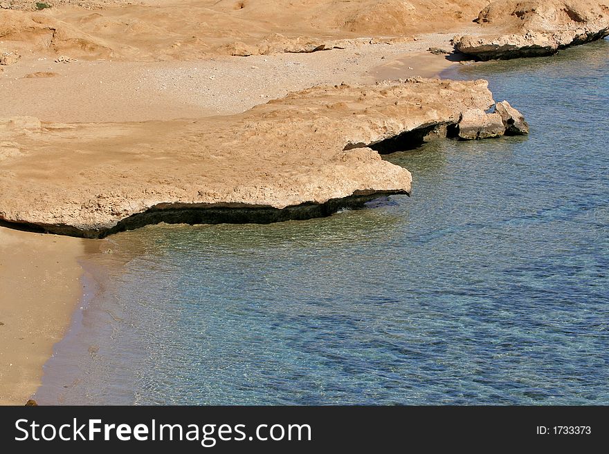 Wild shore and sandy beach at Red Sea