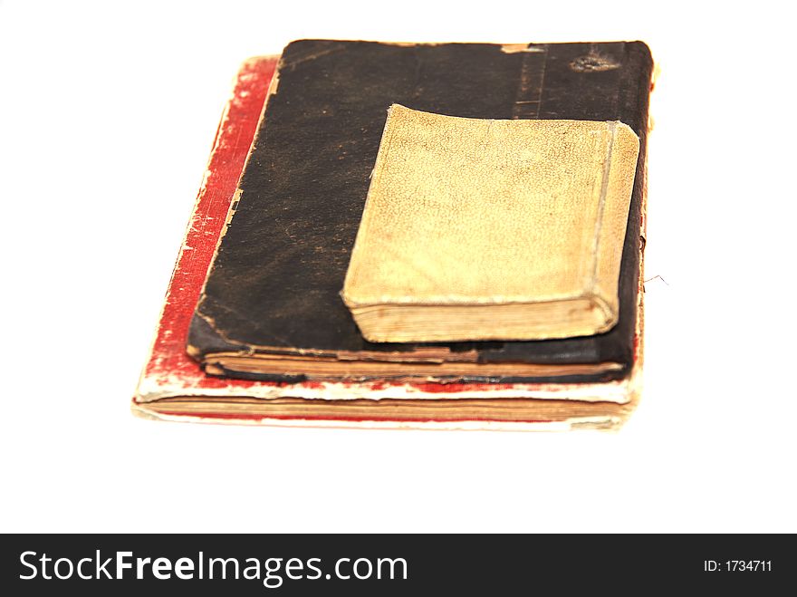 Three very old books in nice composition.