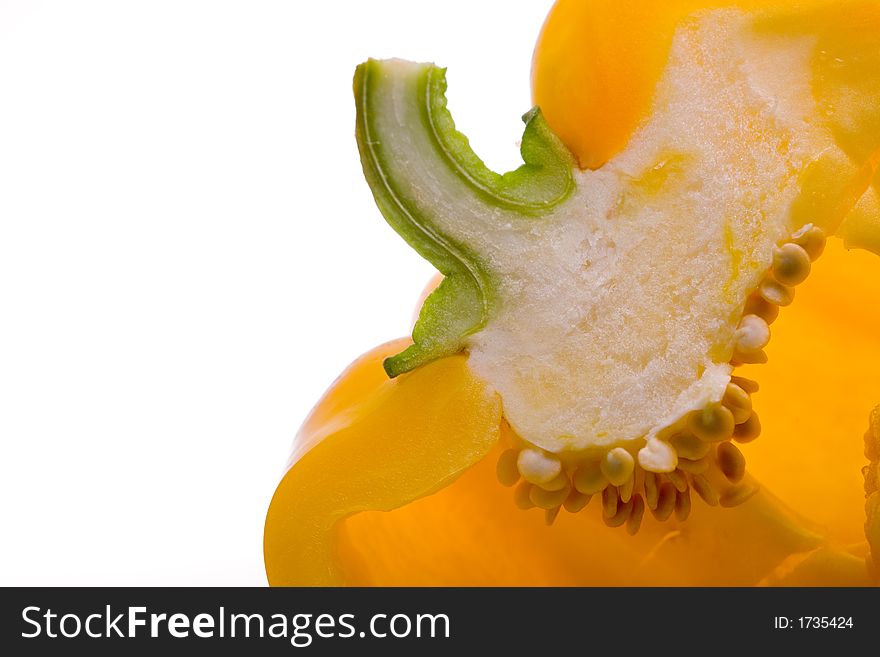 Close-up of a Divided Yellow Bell Pepper on  light background.