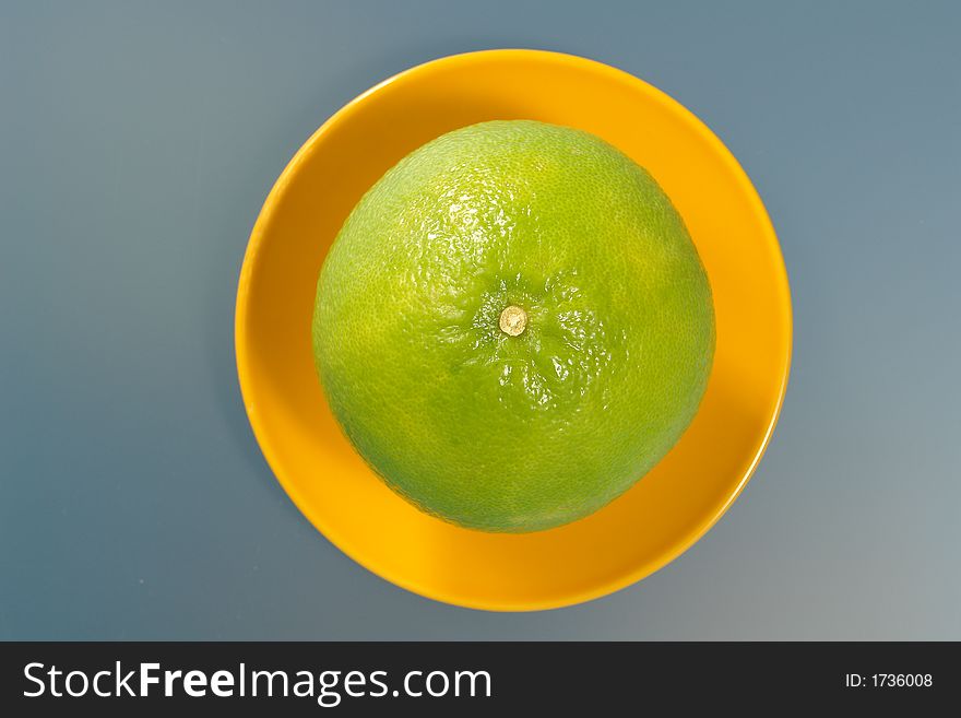 Abstract composition with melon at the yellow dish. Abstract composition with melon at the yellow dish