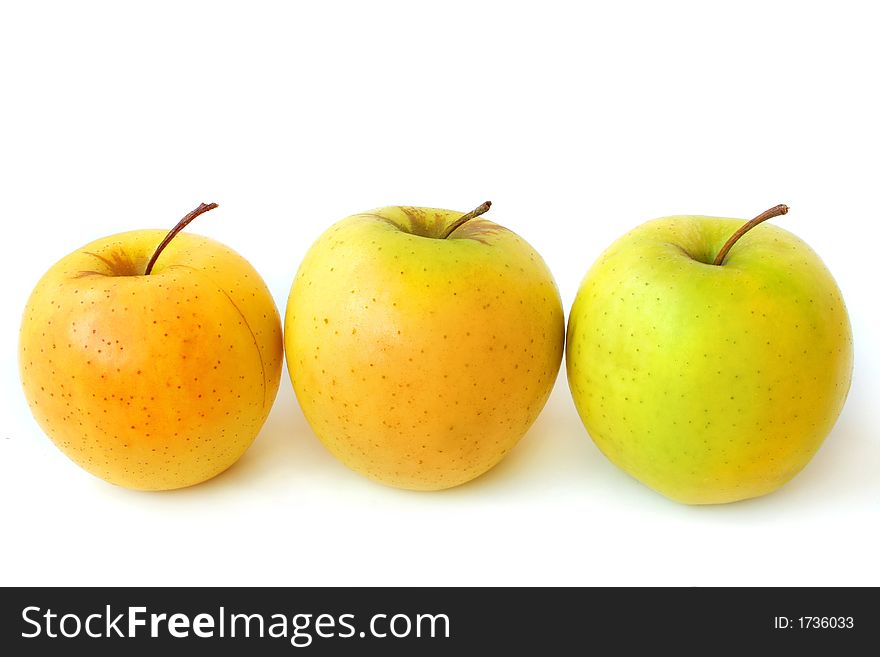 Three ripe delicious apples on a white background. Three ripe delicious apples on a white background