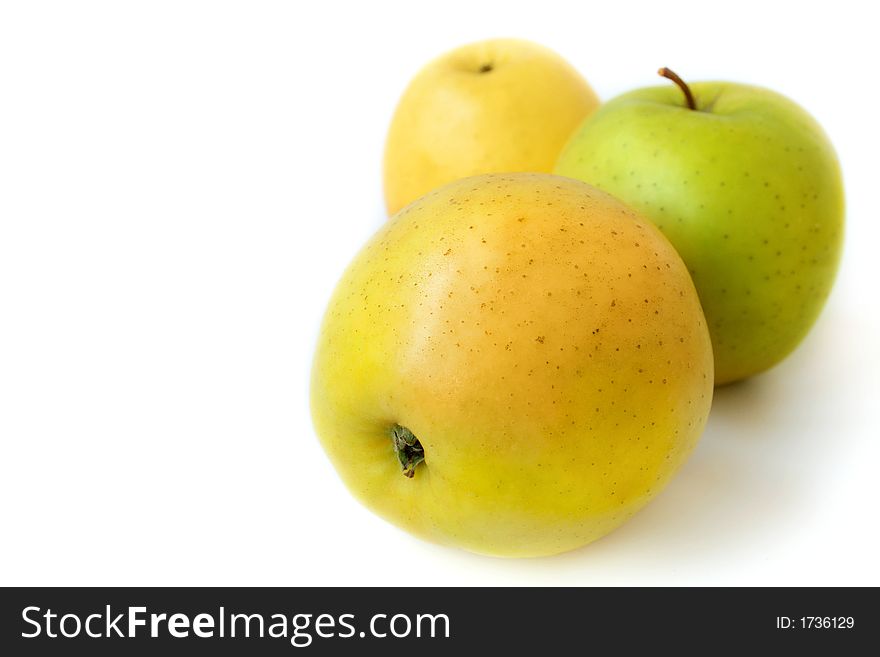 Three ripe delicious apples on a white background. Three ripe delicious apples on a white background