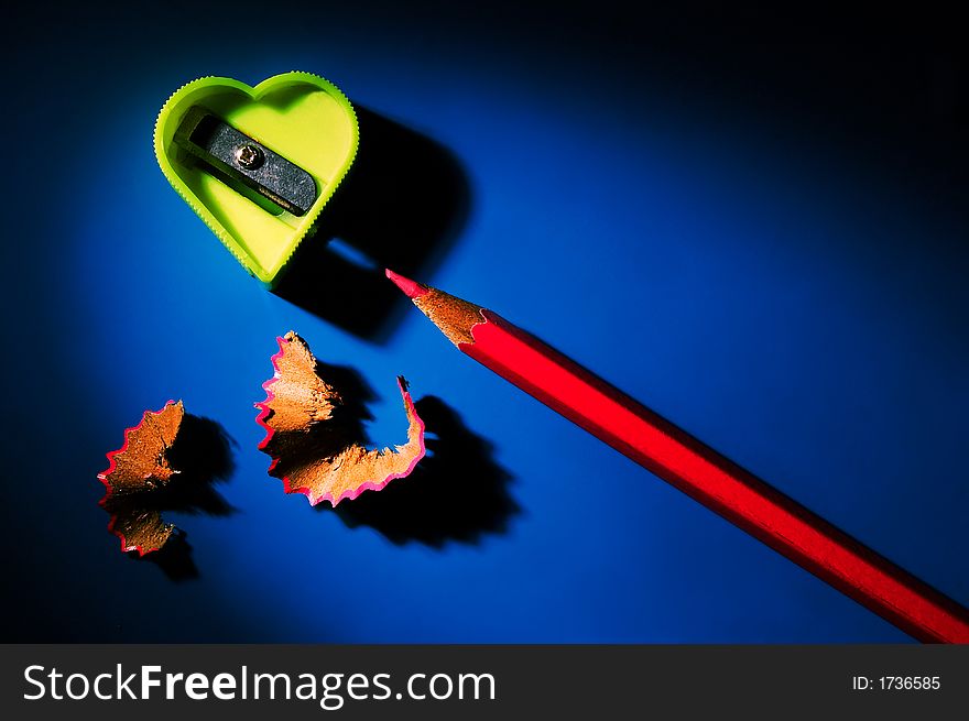 Sharpener for pencils in the form of heart