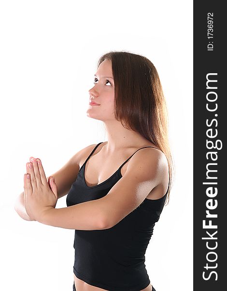 The sports girl meditates after training. The sports girl meditates after training