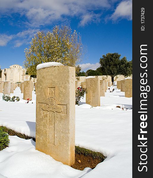 Military Cemetery covered with snow on a clear day. Military Cemetery covered with snow on a clear day