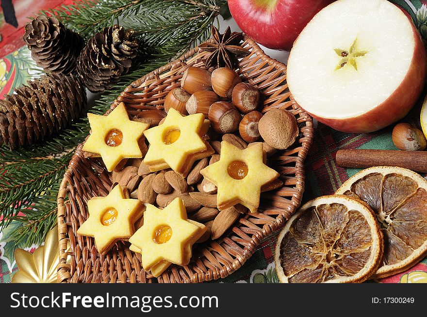 Christmass cookies with fruits on the table. Christmass cookies with fruits on the table