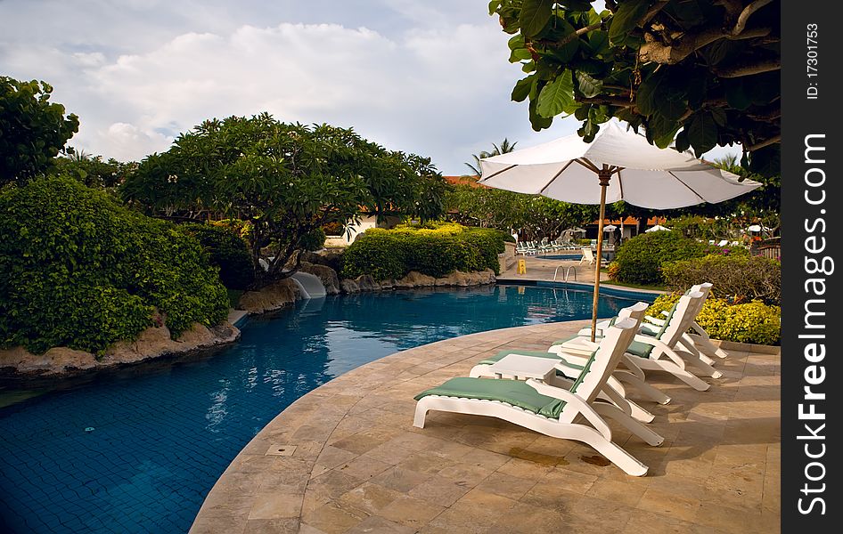 Pool with blue water in a garden