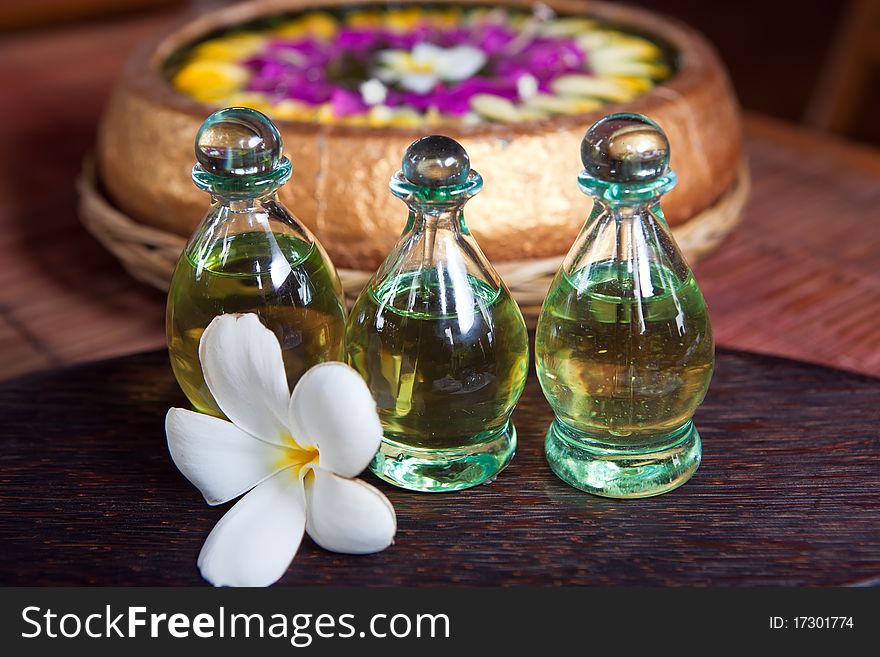 Bottles of essential oil in a spa composition