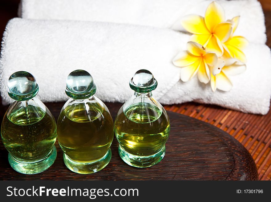 Bottles of essential oil in a spa composition