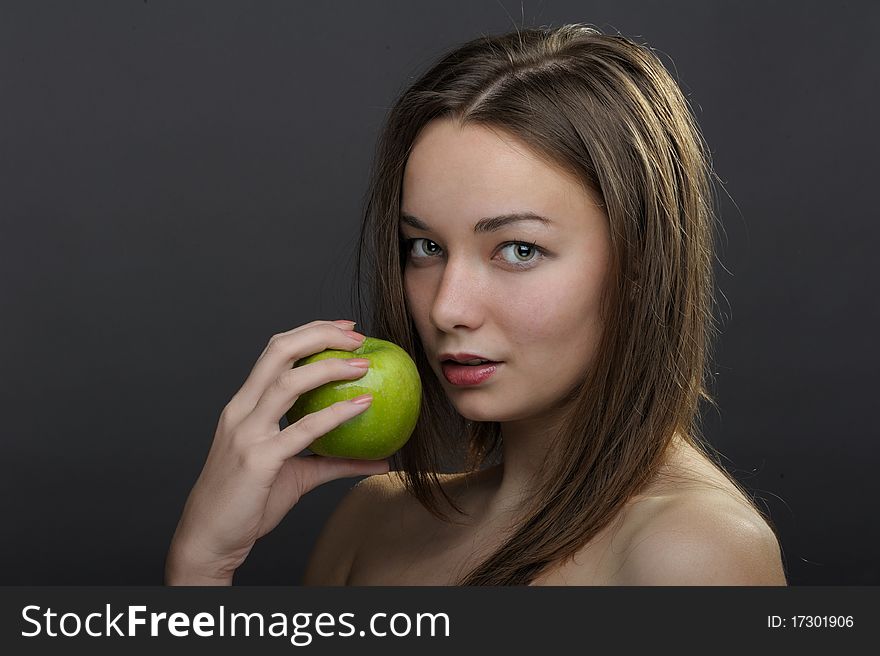 Beautiful woman posing with apple. Beautiful woman posing with apple