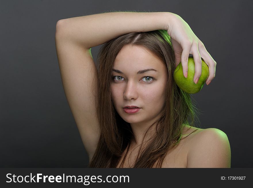 Beautiful woman posing with apple. Beautiful woman posing with apple