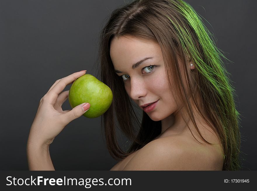 Beautiful woman posing with apple. Beautiful woman posing with apple