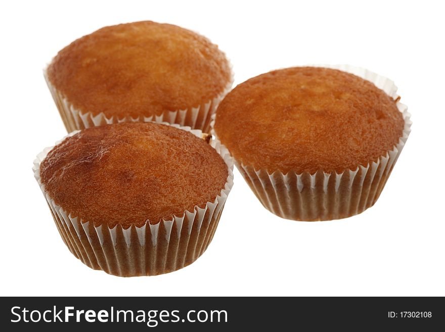 Three fruitcakes are isolated on a white background